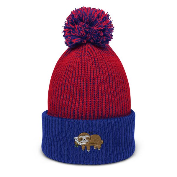 A cozy winter beanie cap with a thick knit design, featuring a fold-over brim and a soft, warm fabric perfect for cold weather.