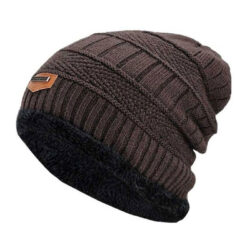 A cozy winter beanie cap with a thick knit design, featuring a fold-over brim and a soft, warm fabric perfect for cold weather.