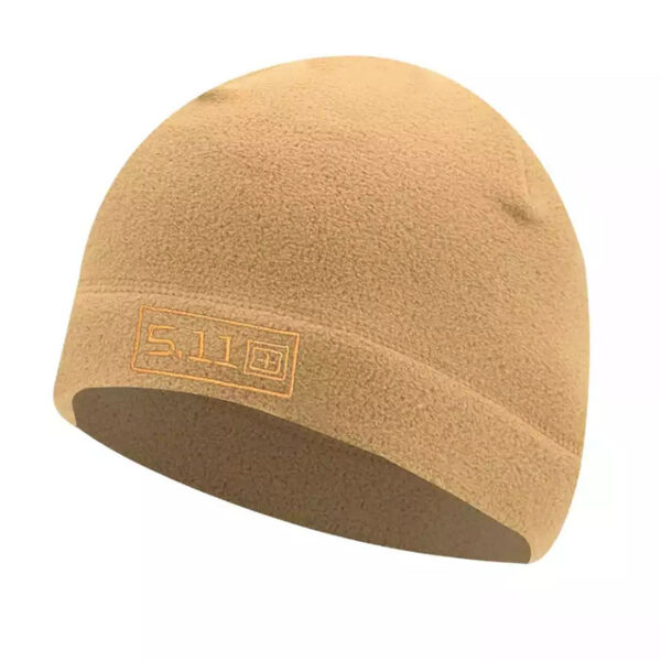 A cozy winter beanie cap with a thick knit design, featuring a fold-over brim and a soft, warm fabric perfect for cold weather.