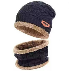 A cozy winter beanie cap with a thick knit design, featuring a fold-over brim and a soft, warm fabric perfect for cold weather.
